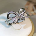 Silver Ring with Shiny Bow
