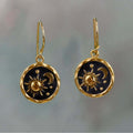 Earrings with sun and moon in gold and silver