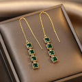 Green Zirconia Dangle Earrings in Gold