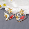 Heart Shaped Earrings with Daisies and Red Petal in Gold