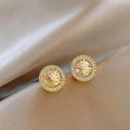 Vintage Radiant Star Gold Earrings
